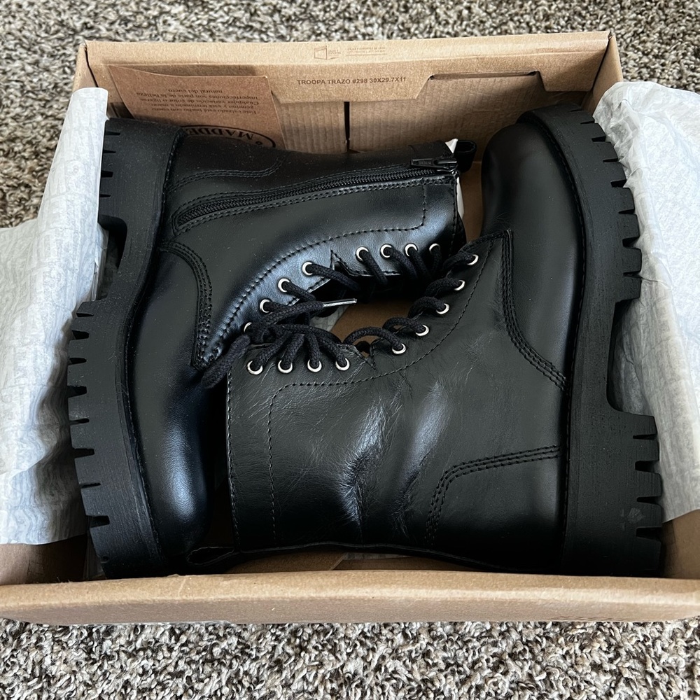 Black leather lace up combat boots with zipper